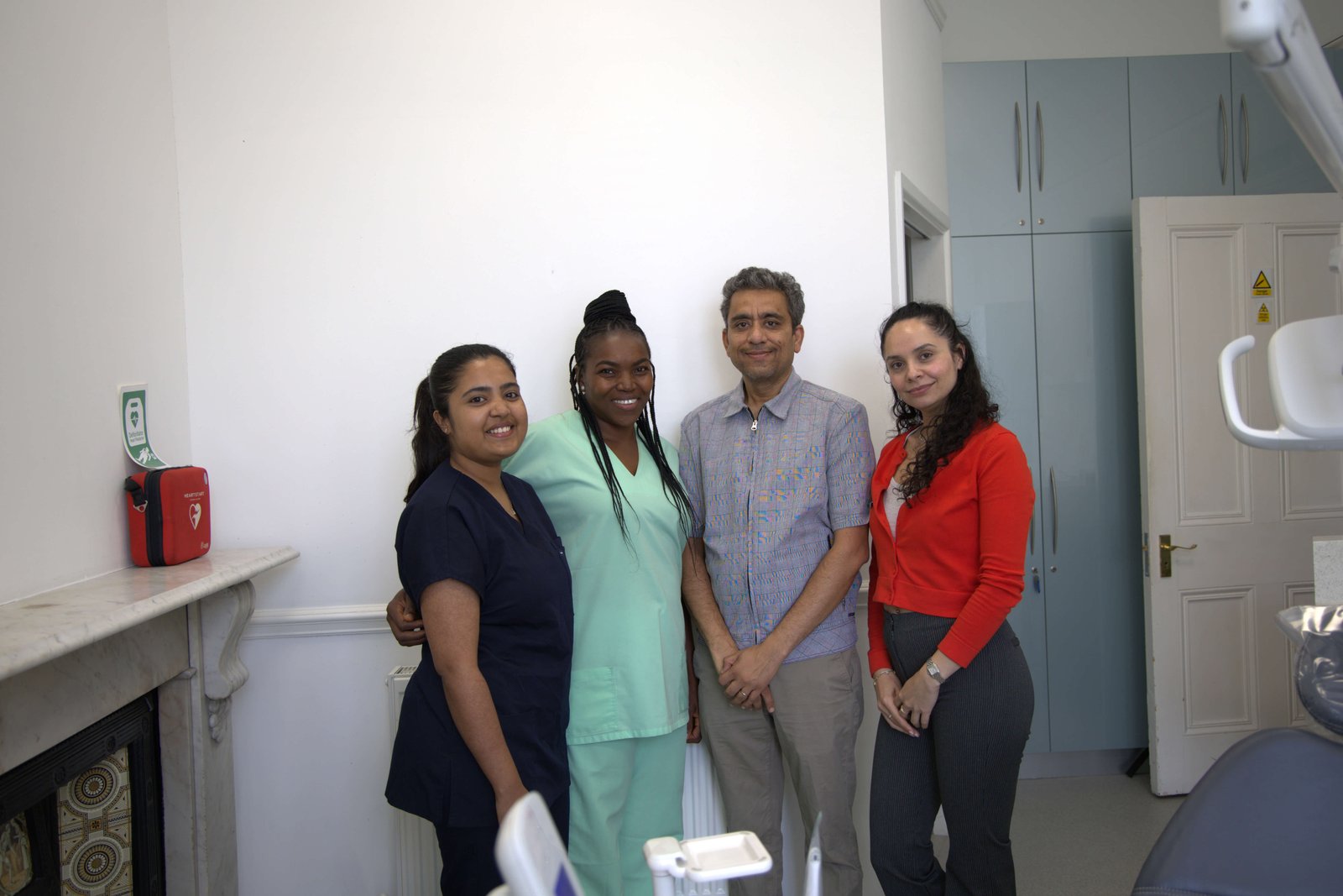 The Aspen Dental Care team — dentist and nurses in the treatment room