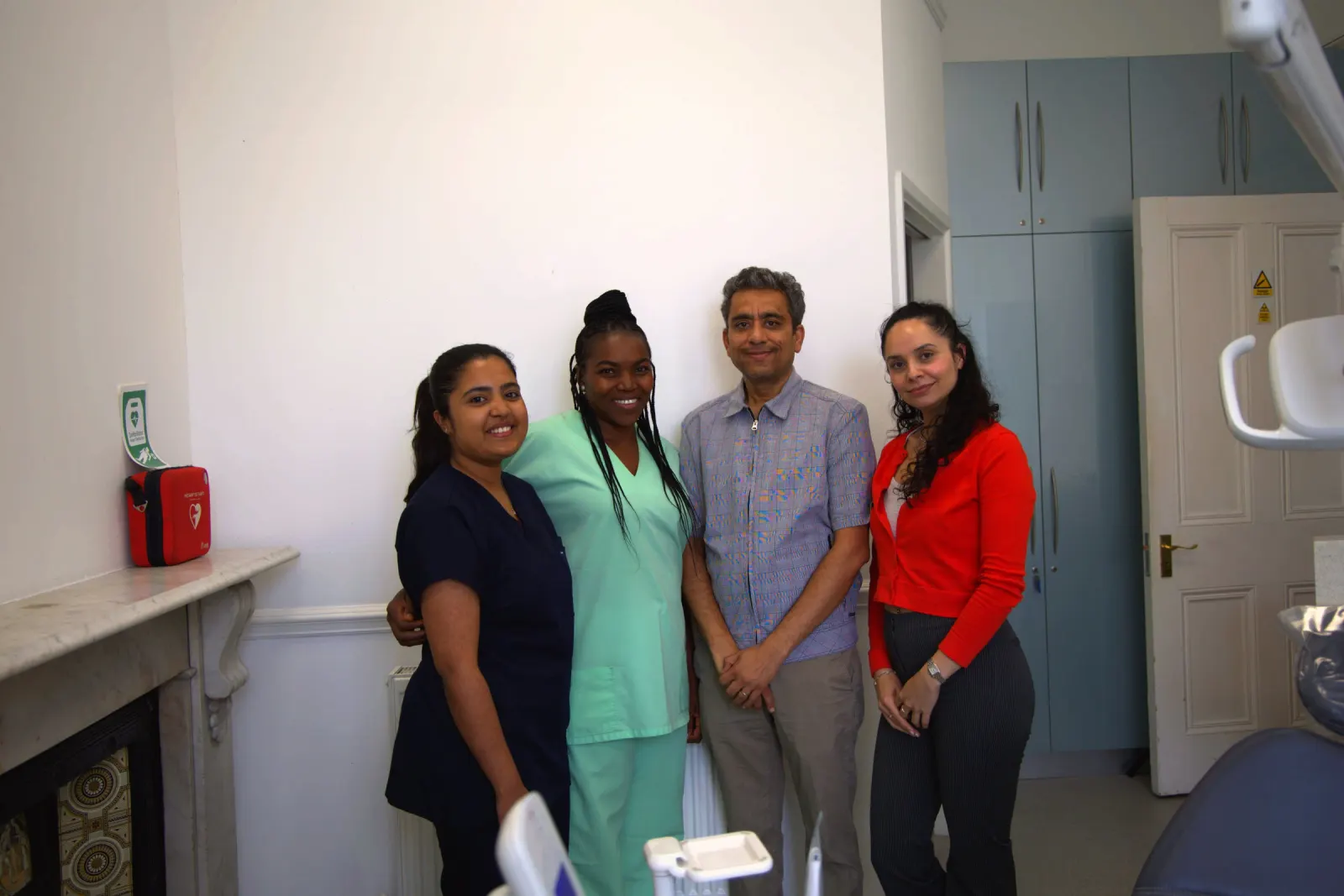 The Aspen Dental Care team — dentist and nurses in the treatment room