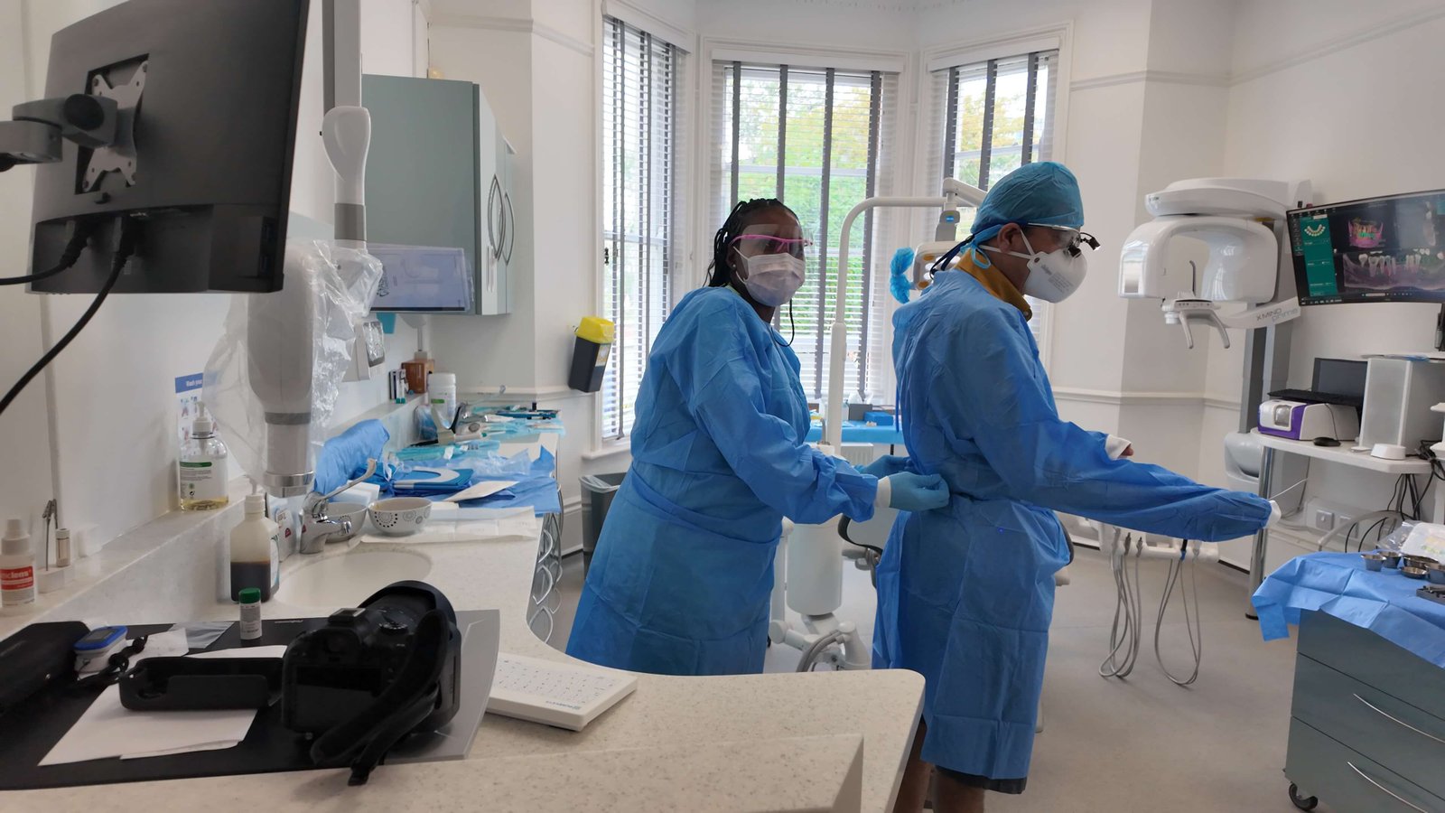 Clinical team preparing the treatment room